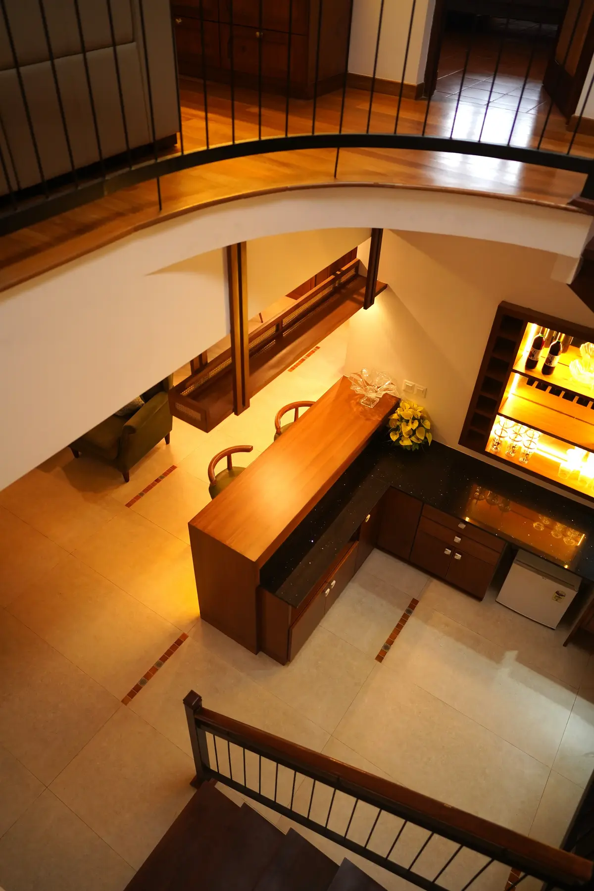 Wooden finish bar counter with elegant barstools